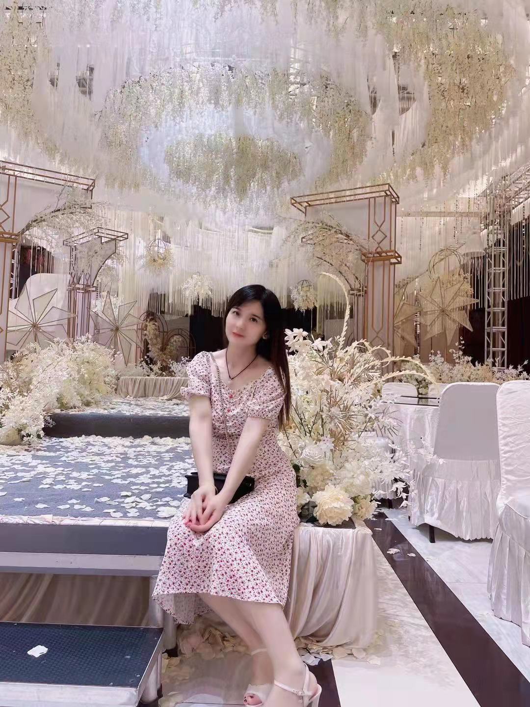 周女士