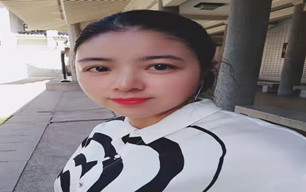 梁女士