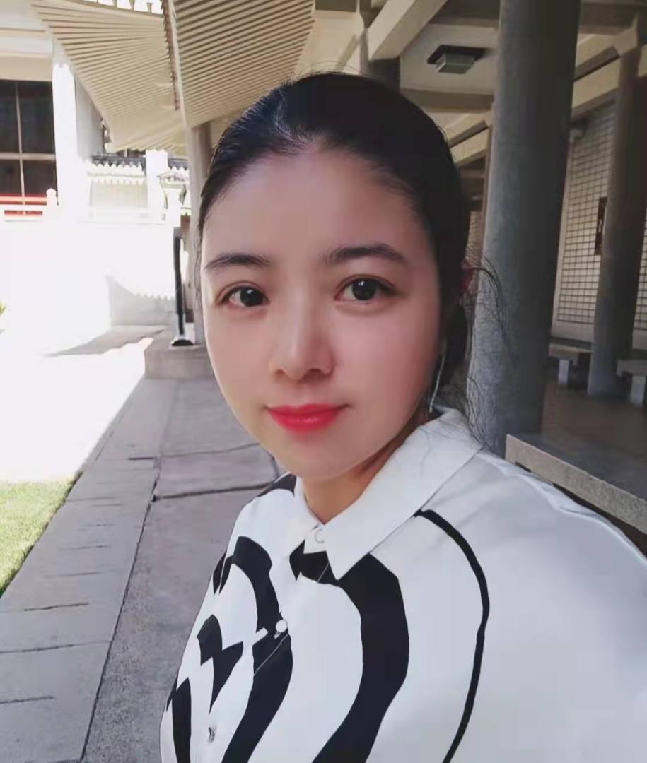 梁女士