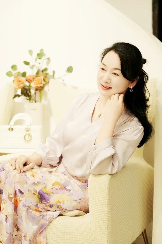 周女士